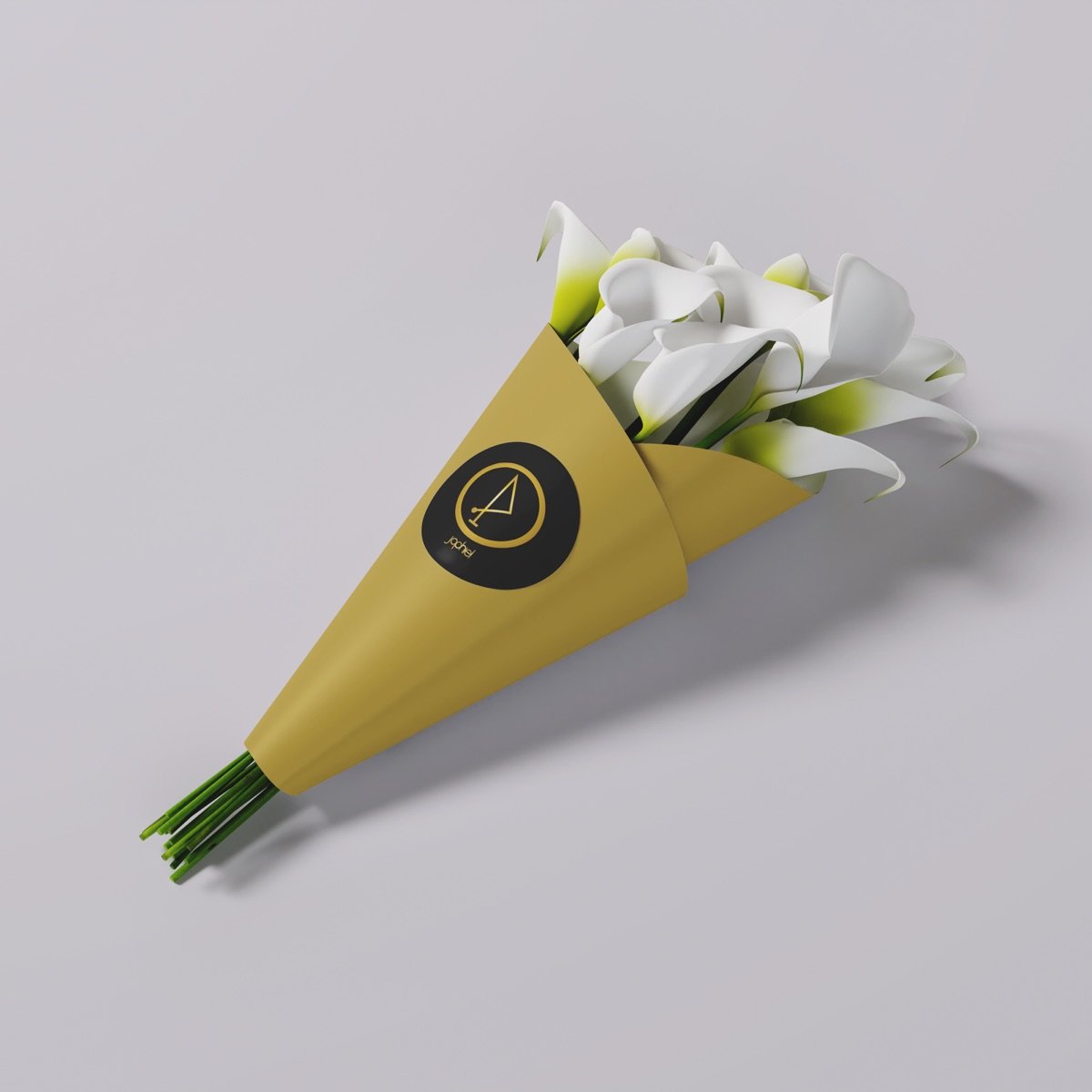 Calla lily bouquet wrapped in Jophiel Flowers gold paper